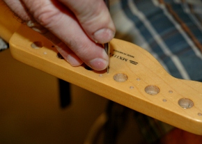 Remove tuners and verify center marks